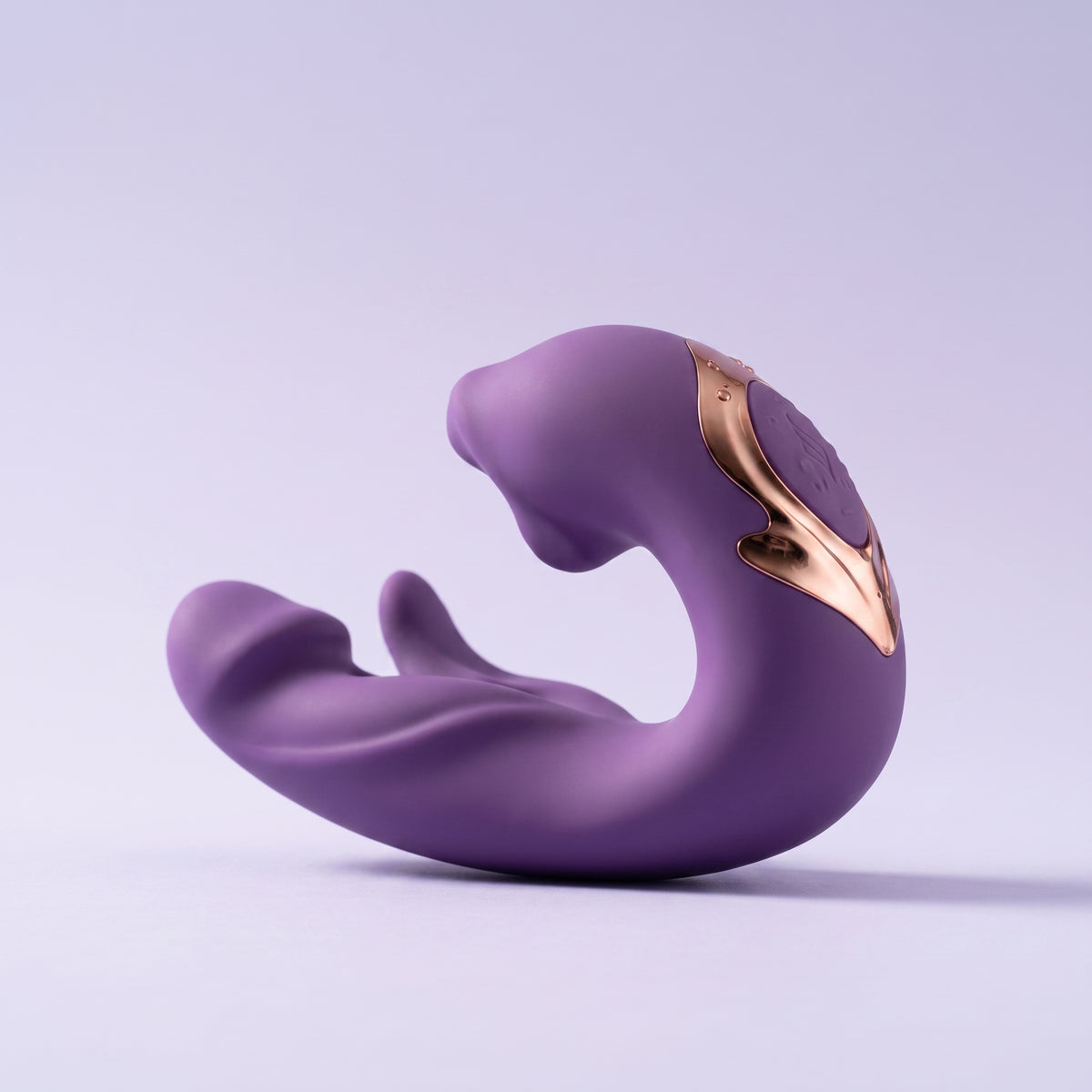 Purple ÉLAN studio profile with rose-gold detailing