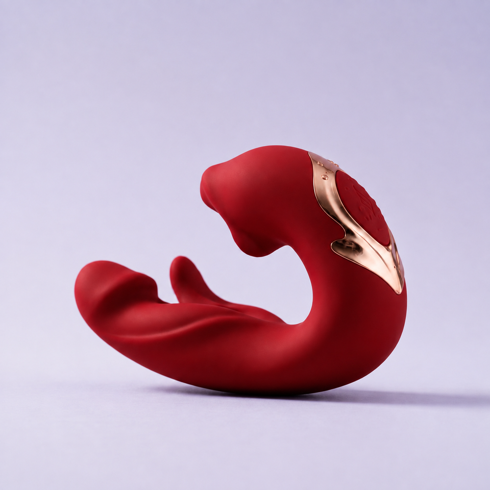 DOVIAR ÉLAN in Red — smooth three-part profile with rose-gold-toned detail on a lilac studio background