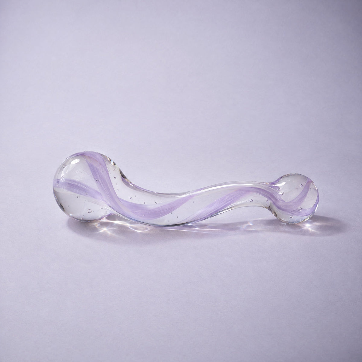 DOVIAR GALET glass pleasure wand on a lilac background