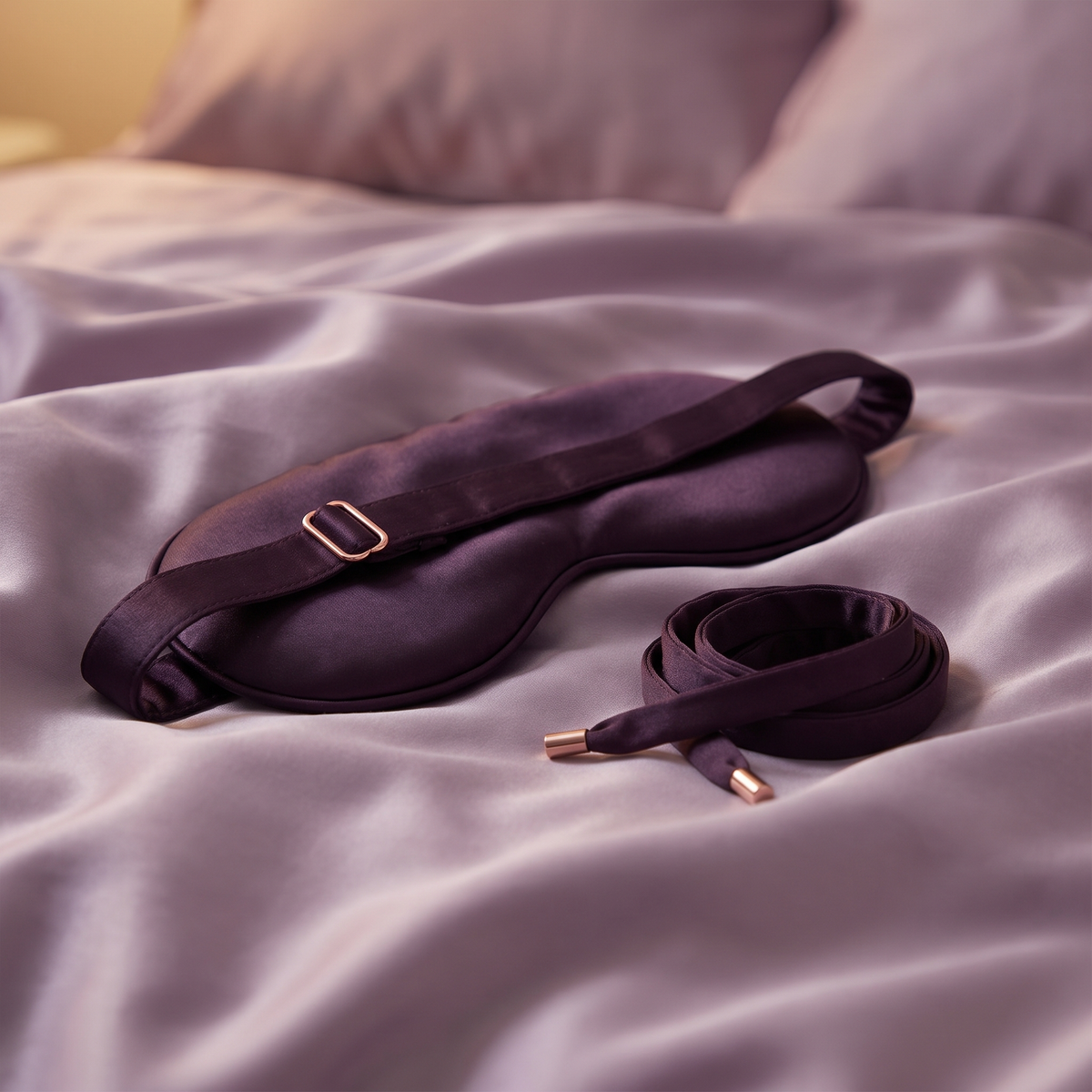 DOVIAR VOILE blindfold and wrist ties on lilac satin bedsheets