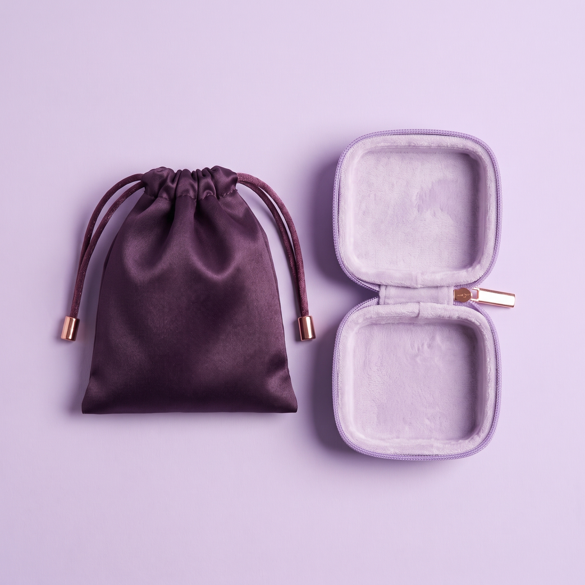 DOVIAR POCHETTE travel case open beside the satin pouch