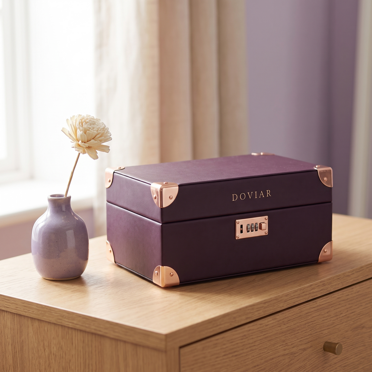 DOVIAR COFFRET lockable storage box on an oak nightstand